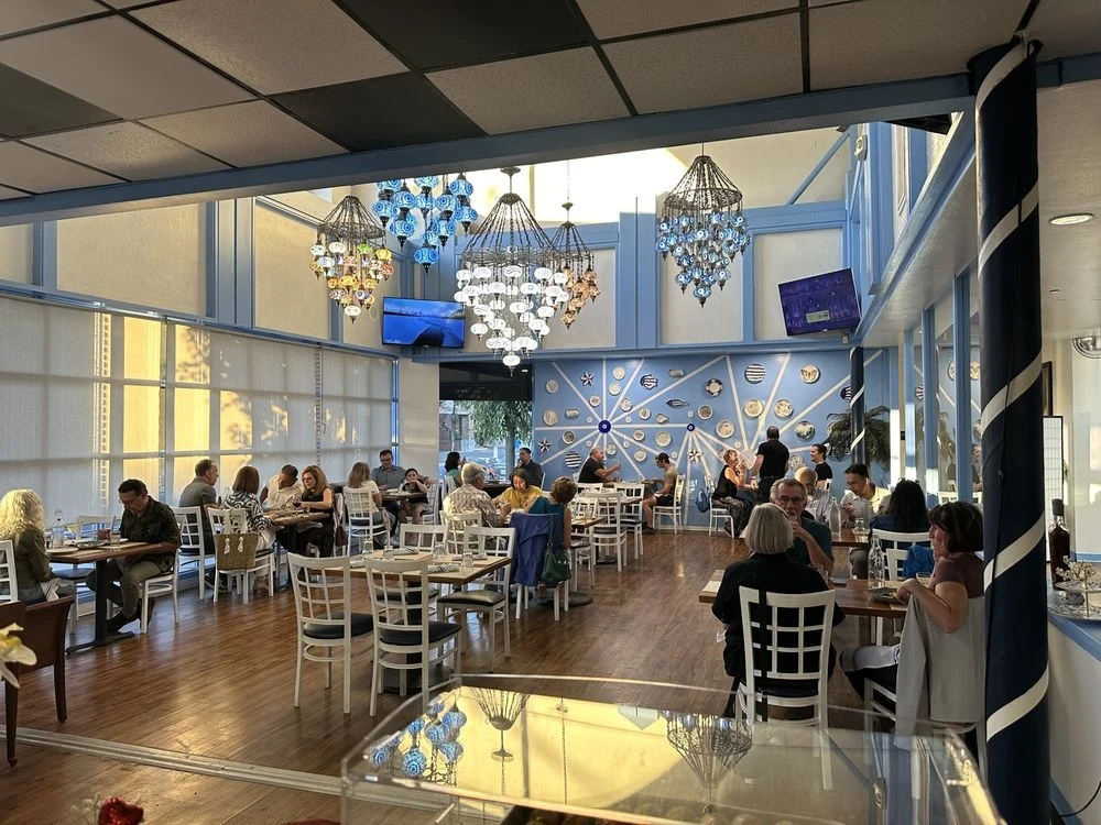 Kalimera Bar & Grill Dining Room - Elegant Mediterranean atmosphere with Turkish chandeliers