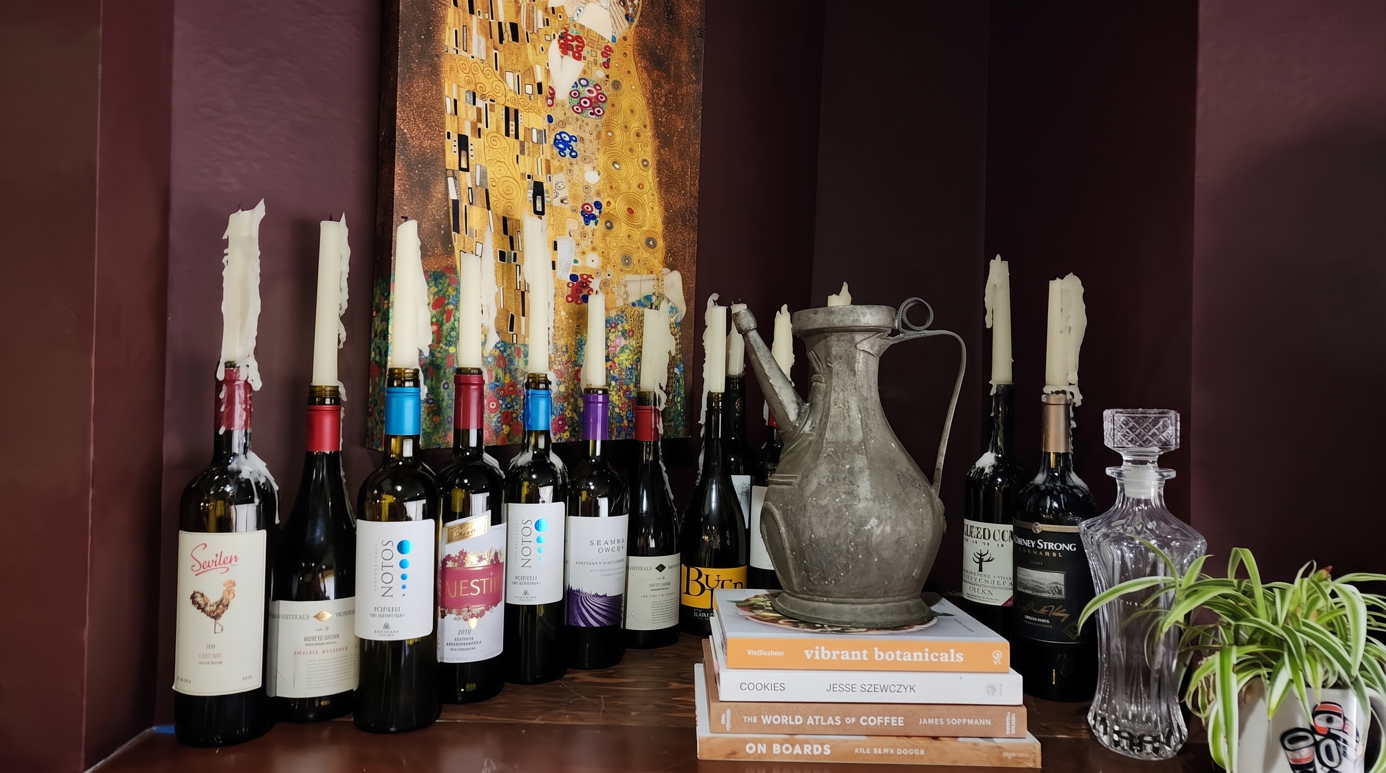Wine bottles used as candle holders on the mantel in the new space next to Kalimera