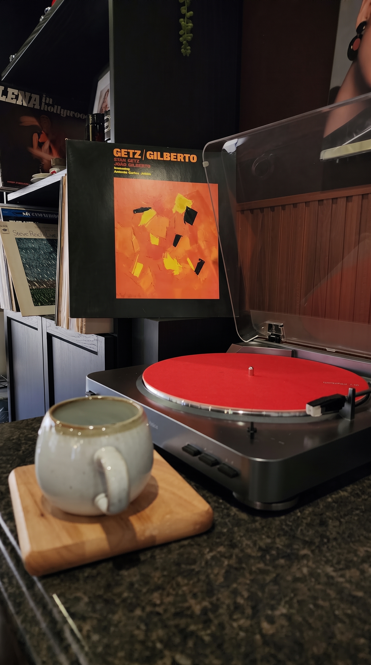 Record player and coffee mug in the new space next to Kalimera