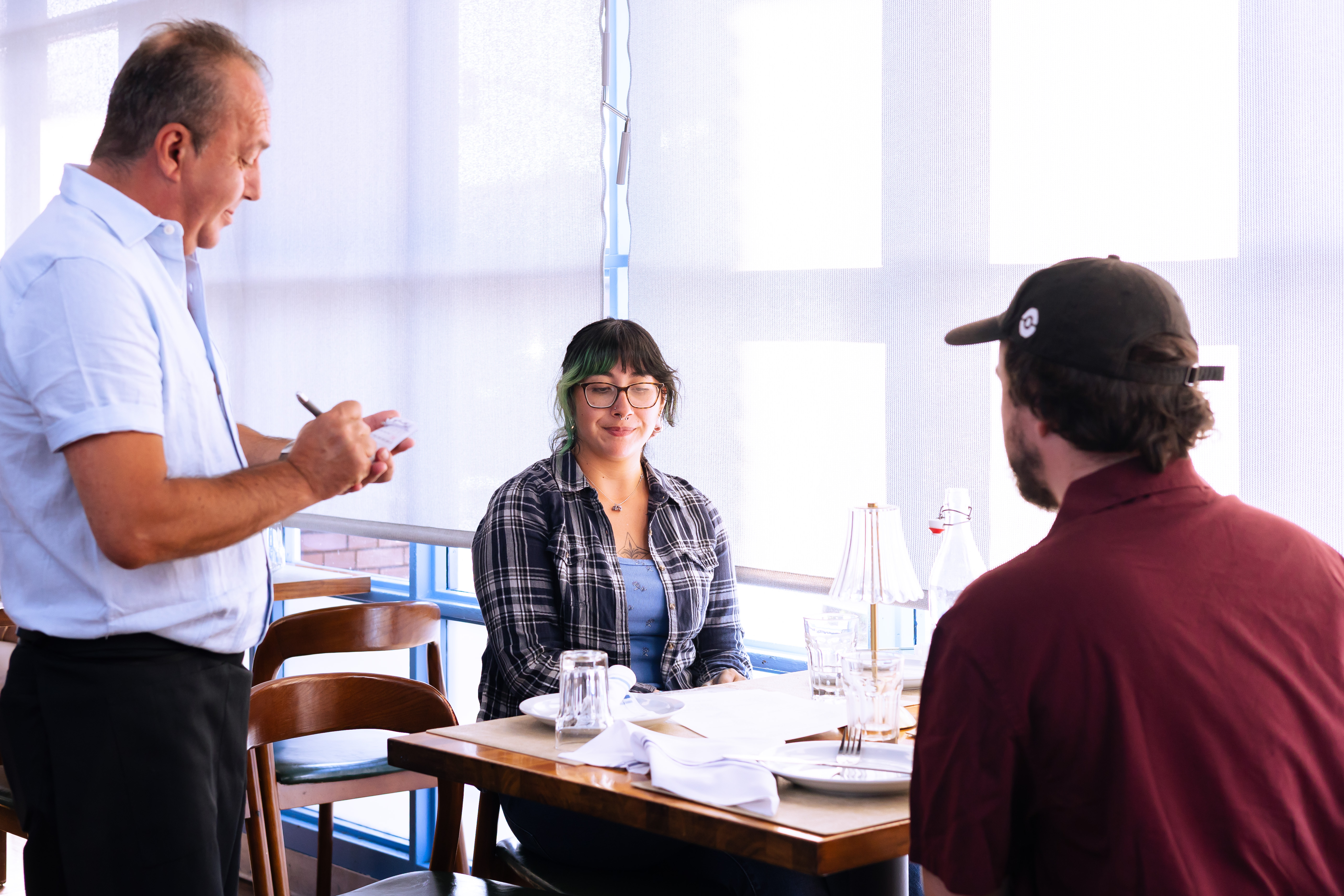 Order taken table-side at Kalimera Bar & Grill in downtown Santa Rosa
